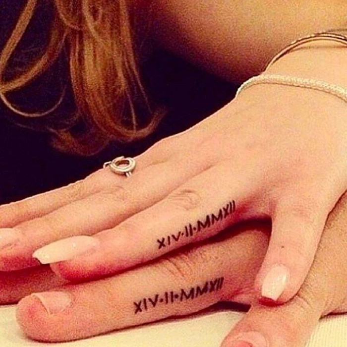  Hình xăm có nội dung là ngày cưới viết bằng các con số La mã - Ảnh: Instagram
