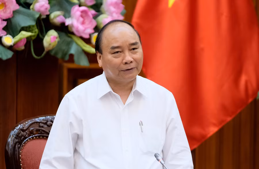 Thủ tướng Nguyễn Xuân Phúc phát biểu tại cuộc họp - Ảnh: VGP/Quang Hiếu