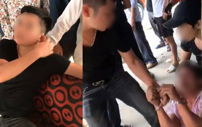 Nhóm thanh niên dùng còng số 8 bắt giữ người giữa đường. Nhóm thanh niên dùng còng số 8 bắt giữ người giữa đường.