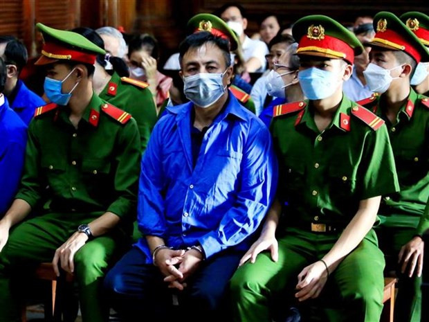 Bị cáo Nguyễn Minh Khải tại phiên xét xử ngày 30/11/2022. (Ảnh: Thành Chung/TTXVN)