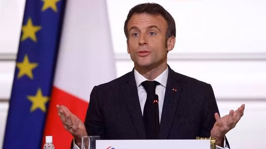  Tổng thống Pháp Emmanuel Macron phát biểu tại Phủ tổng thống Elysee ở Paris ngày 12/12. Ảnh: AFP 