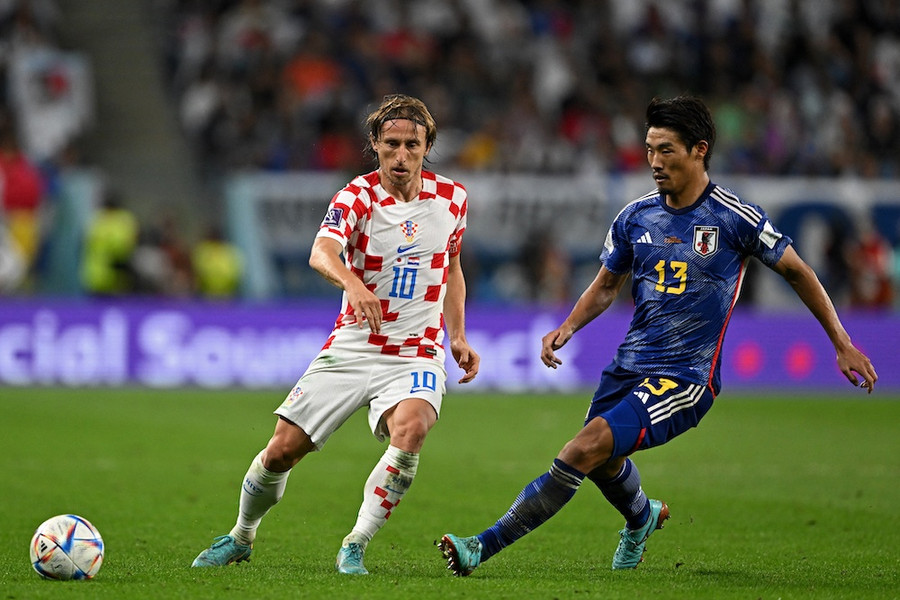 Luka Modric (trái) đang quyết tâm để lại dấu ấn ở kỳ World Cup cuối cùng của sự nghiệp. Ảnh: AFP