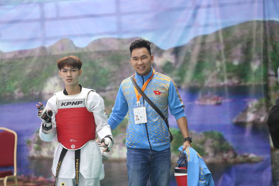 VĐV Nhật Quang (trái) đã có trận đấu mở màn cho Taekwondo Gia Lai. Ảnh: Văn Ngọc