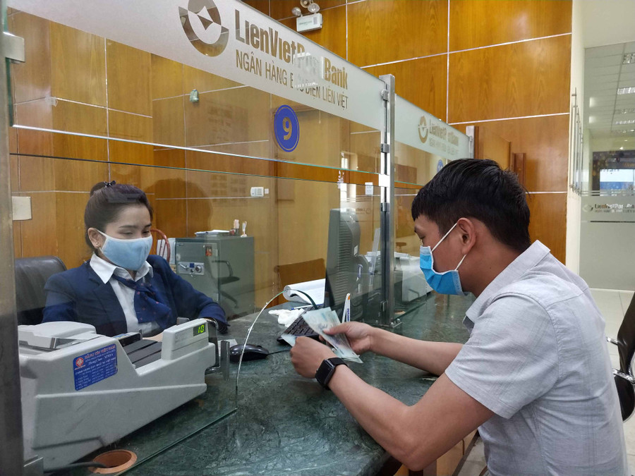 Trong bối cảnh thị trường hiện nay, các ngân hàng thương mại rất cẩn trọng khi tăng trưởng tín dụng nhằm kiểm soát chặt chẽ chất lượng tín dụng. Ảnh: Sơn Ca 