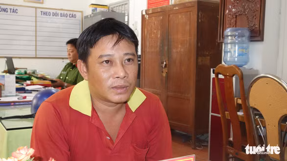  Nghi phạm Giang Văn Nghĩa tại cơ quan Công an - Ảnh: TIẾN VŨ