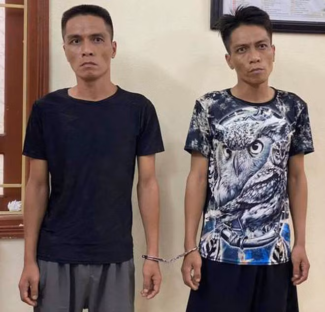 Phạm Quốc Việt và Phạm Thanh Đức tại cơ quan công an