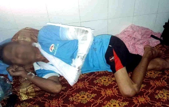 Ông Trần X.L đang nằm điều trị tại bệnh viện Ông Trần X.L đang nằm điều trị tại bệnh viện