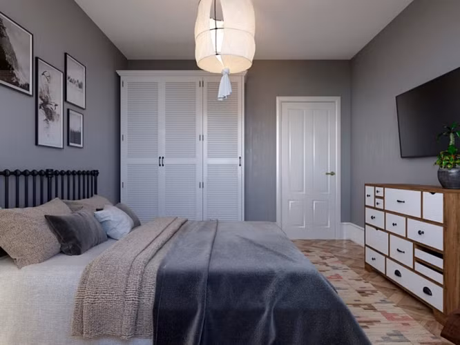 Tủ quần áo màu trắng xua tan cảm giác buồn tẻ trong phòng.