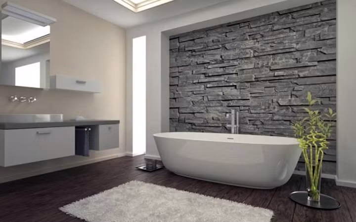 Phòng tắm rộng thích hợp với diện tích từ 16-22m2. Ngoài bồn tắm, gia chủ có thể kê thêm một bàn trang điểm nhỏ và trang trí thêm cây xanh. Ảnh: Sejongfaucet. Ảnh: Homestratosphere.