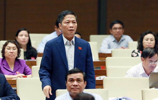 Bộ trưởng Bộ Công Thương Trần Tuấn Anh tại diễn đàn quốc hội. (Ảnh: quochoi.gov.vn) Bộ trưởng Bộ Công Thương Trần Tuấn Anh tại diễn đàn quốc hội. (Ảnh: quochoi.gov.vn)