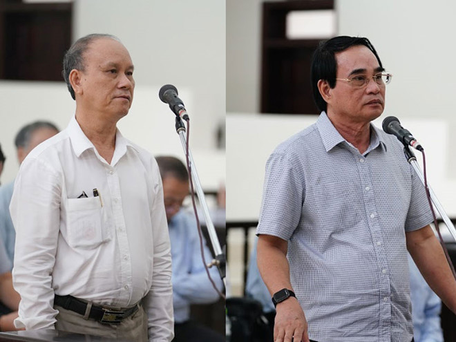 Bị cáo Trần Văn Minh (trái) và Văn Hữu Chiến tại tòa- Ảnh: Lê Quân