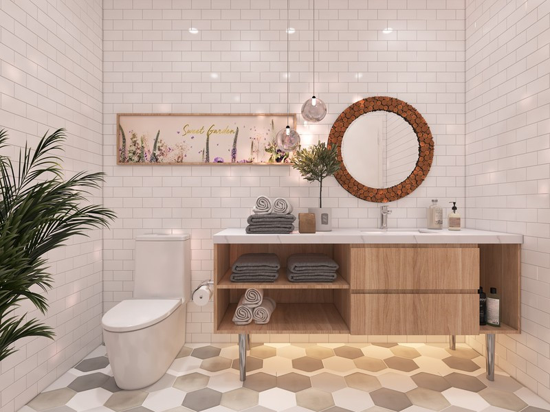 Trong phòng tắm, chủ đầu tư hoàn toàn loại bỏ những chi tiết thừa thãi, làm rối bố cục. Sàn lát bằng đá hình tổ ong cùng với đèn led, cây xanh mang đến sức sống cho căn phòng.