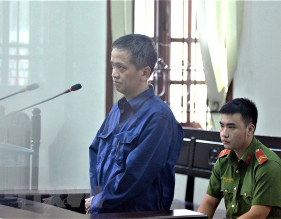  Bị cáo Nguyễn Tiến Dũng tại phiên tòa. Ảnh: TTXVN