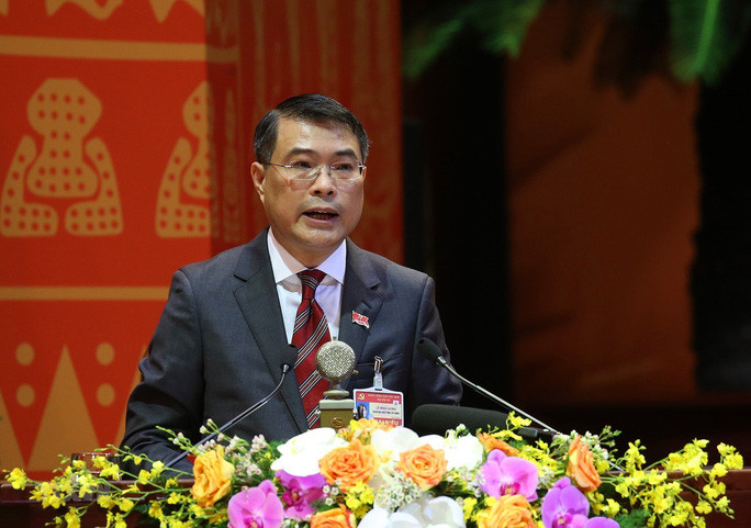  Ông Lê Minh Hưng, Ủy viên Trung ương Đảng, Chánh Văn phòng Trung ương Đảng, báo cáo Chương trình làm việc của Đại hội