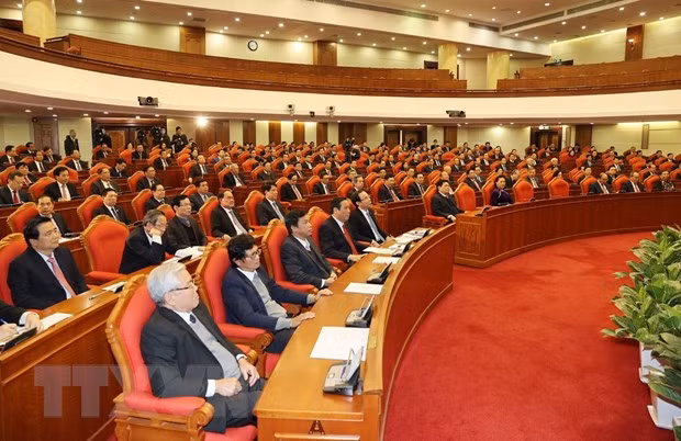 Các đại biểu dự bế mạc Hội nghị Trung ương lần thứ 15. (Ảnh: Trí Dũng/TTXVN)