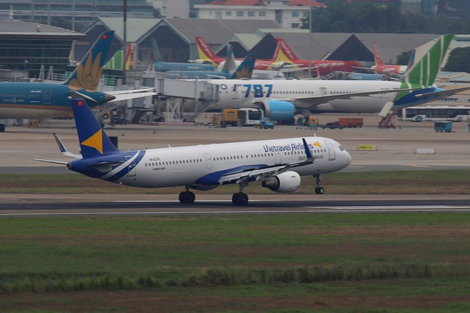 Với sự ra đời của Vietravel Airlines, Vietravel Holdings chính thức trở thành doanh nghiệp du lịch đầu tiên tại Việt Nam khép kín hệ sinh thái dịch vụ lữ hành hàng không - Ảnh: Đậu Tiến Đạt  Với sự ra đời của Vietravel Airlines, Vietravel Holdings chính thức trở thành doanh nghiệp du lịch đầu tiên tại Việt Nam khép kín hệ sinh thái dịch vụ lữ hành hàng không - Ảnh: Đậu Tiến Đạt