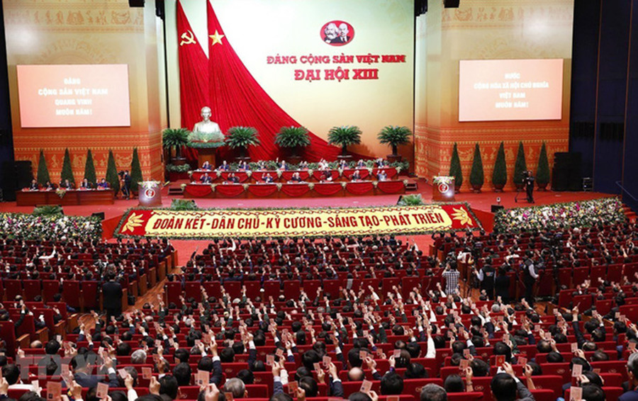 Các đại biểu biểu quyết thông qua Quy chế làm việc của Đại hội. Ảnh: TTXVN Các đại biểu biểu quyết thông qua Quy chế làm việc của Đại hội. Ảnh: TTXVN