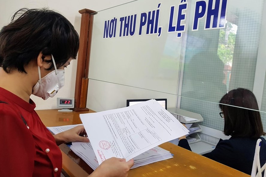  Năm 2021 tiếp tục cải cách mạnh mẽ thủ tục hành chính, điều kiện kinh doanh để các thành phân kinh tế phát triển mạnh mẽ, đặc biệt là kinh tế tư nhân. Ảnh: Vũ Long