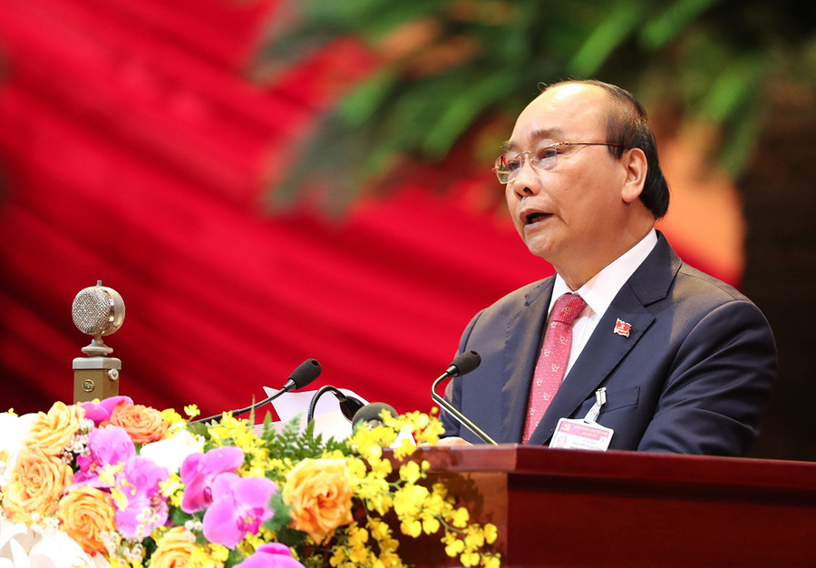 Thủ tướng Chính phủ Nguyễn Xuân Phúc đọc diễn văn khai mạc Đại hội. Ảnh: Phương Dung