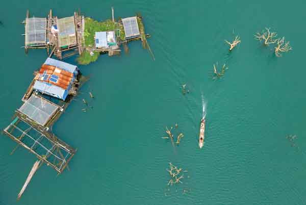 Làng chài trên sông Sê San (huyện Ia Grai). Ảnh: Phan Nguyên Làng chài trên sông Sê San (huyện Ia Grai). Ảnh: Phan Nguyên