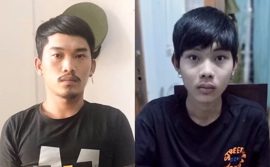 Đối tượng Nguyễn Khánh Trung (bìa trái) và Hồ Thanh Luật tại cơ quan công an. Ảnh: Thúy Trinh