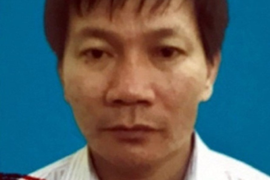 Bị can Nguyễn Tuấn Hùng cùng đồng phạm chiếm đoạt gần 5 tỉ đồng của 14 người lao động. Ảnh: H.Vũ