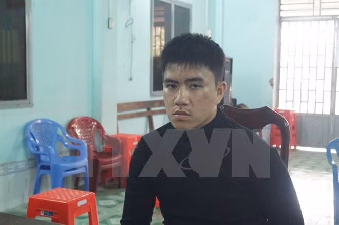 Đối tượng Lê Huỳnh Đức bị bắt giữ. (Ảnh: Văn Việt/TTXVN)