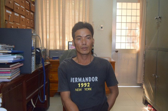 Lê Văn Thiện tại cơ quan công an. Ảnh: Công an cung cấp