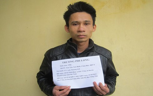 Đối tượng Trương Phi Long tại cơ quan điều tra.