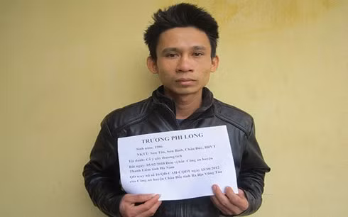 Đối tượng Trương Phi Long tại cơ quan điều tra.