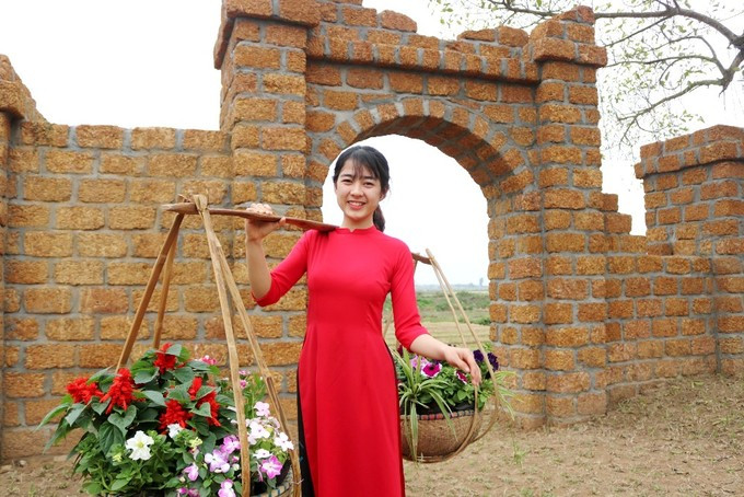 ... gánh hoa đi chợ.