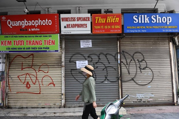 Phố cổ Hà Nội từng vắng lặng, cửa đóng then cài trong giai đoạn dịch COVID-19 bùng phát. (Ảnh: M.Mai/Vietnam+)