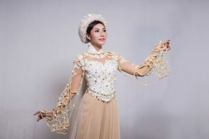 Đặng Thu Thảo chọn trang phục áo dài truyền thống có tên Báu vật của đại dương để trình diễn trong cuộc thi Hoa hậu Quốc tế 2014 Đặng Thu Thảo chọn trang phục áo dài truyền thống có tên Báu vật của đại dương để trình diễn trong cuộc thi Hoa hậu Quốc tế 2014