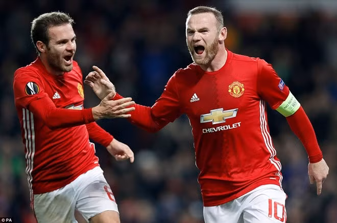  Rooney và Mata cùng ghi bàn giúp Manchester United giành chiến thắng. (Nguồn: PA)
