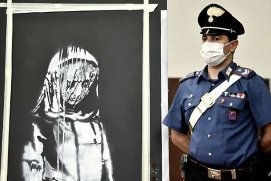  Tác phẩm nghệ thuật Cô gái than khóc của Banksy bị đánh cắp đã được tìm thấy ở Italia đầu tháng 6. Ảnh: AFP