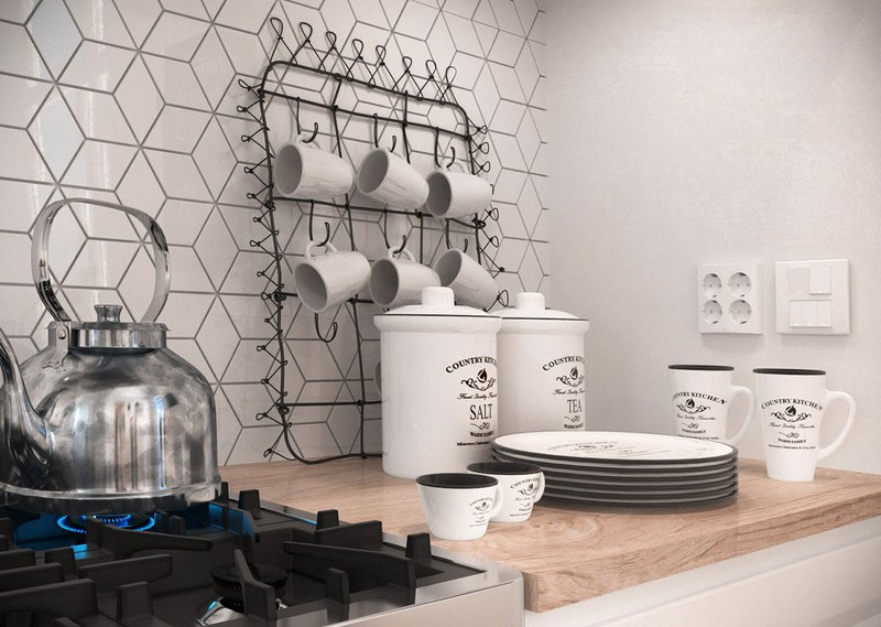 Cốc bằng gốm được treo trên một chiếc giá có hình thù dễ thương. Cốc bằng gốm được treo trên một chiếc giá có hình thù dễ thương.