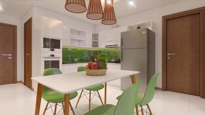 Ghế trong phòng ăn cũng được thay bằng màu xanh để mang đến cảm giác mát mẻ. Tủ bếp được sơn lại, giúp chị dễ dàng dọn dẹp hơn trong những ngày Tết sắp tới.