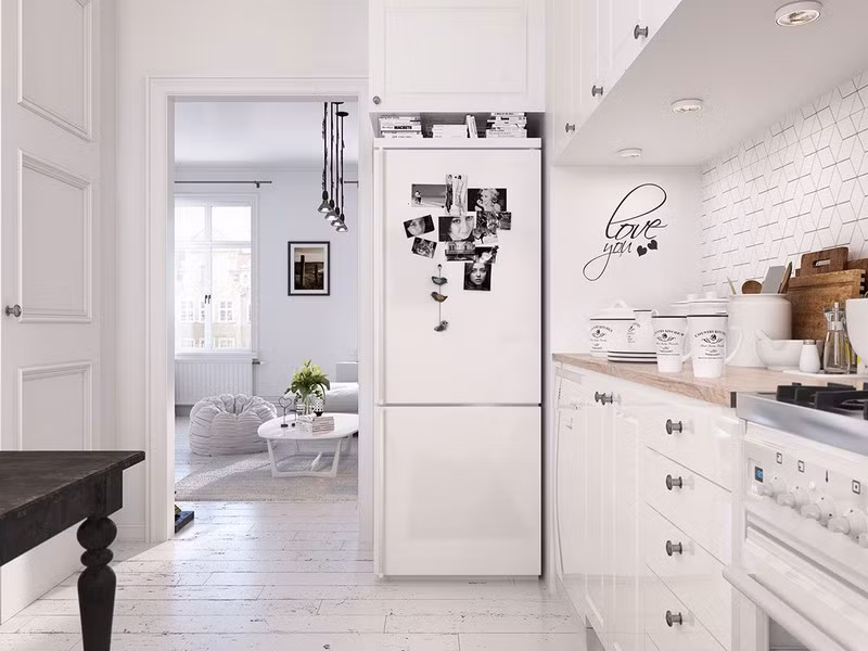 Những bức ảnh ghép trên tủ lạnh mang đến cảm giác gần gũi.