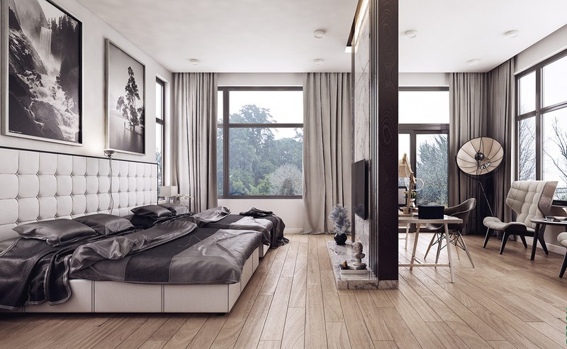  Tường gỗ ngăn cách khu vực giường ngủ với phòng làm việc.