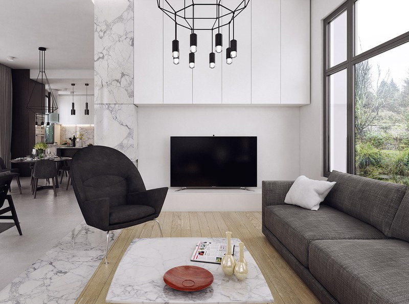 Từ bàn ghế, tủ tường cho đến đèn trang trí đều sử dụng màu đen và xám chủ đạo.