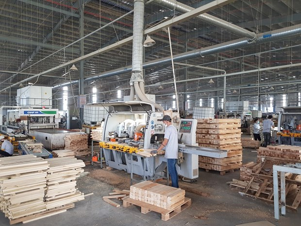 Sản xuất hàng xuất khẩu tại Công ty TNHH MTV Triệu Phú Lộc, Bình Dương. (Ảnh: TTXVN) Sản xuất hàng xuất khẩu tại Công ty TNHH MTV Triệu Phú Lộc, Bình Dương. (Ảnh: TTXVN)