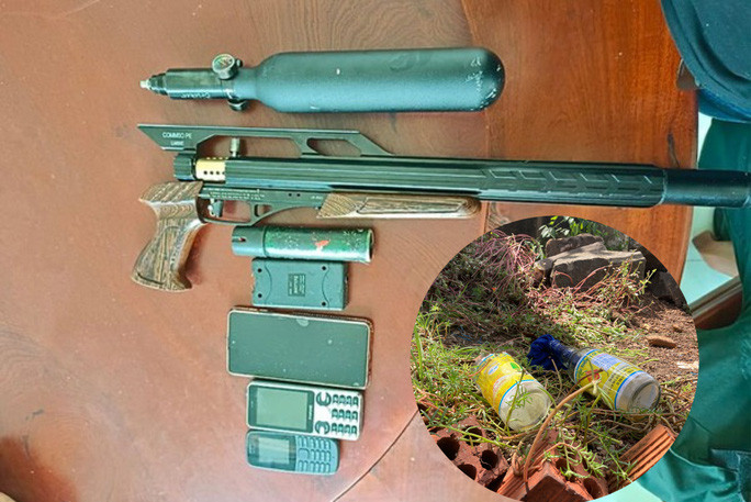 Súng với bom xăng mà đối tượng "Cọp" sử dụng khống chế con tin, tấn công công an Súng với bom xăng mà đối tượng