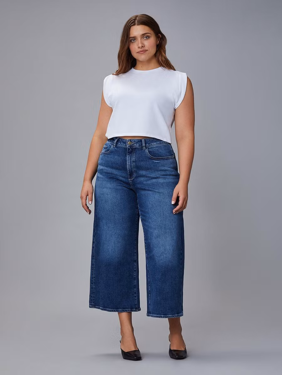 Quần jeans lửng ống rộng lưng cao thoải mái của DL 1961.