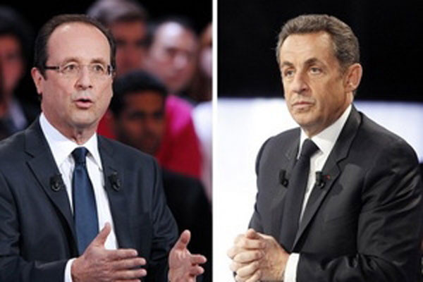 Hai ứng cử viên Francois Hollande (trái) và Nicolas Sarkozy.