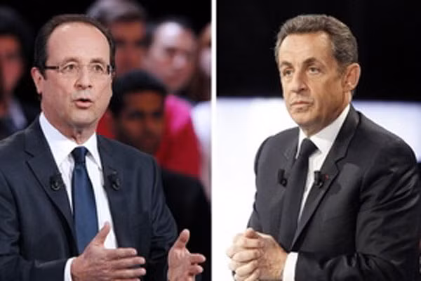 Hai ứng cử viên Francois Hollande (trái) và Nicolas Sarkozy.