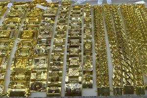 Ngày 2-8, giá vàng trong nước đột ngột tăng lên mức 123,5 triệu đồng/lượng