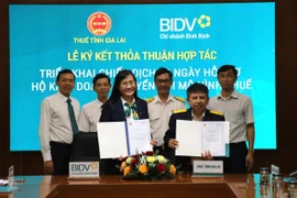 Thuế tỉnh Gia Lai hợp tác với BIDV triển khai chiến dịch 60 ngày hỗ trợ hộ kinh doanh chuyển đổi mô hình thuế. Ảnh" T.SỸ