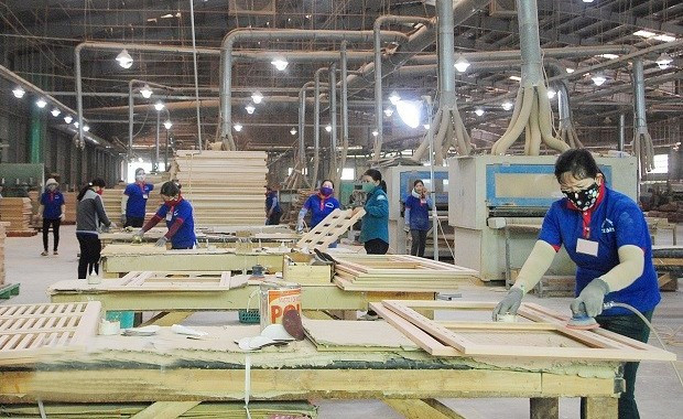 Phân xưởng sản xuất đồ gỗ xuất khẩu của Công ty CP Kỹ nghệ gỗ Tiến Đạt. Ảnh: Ngọc Nhuận phan-xuong-san-xuat-do-go-xuat-khau-cua-cong-ty-cp-ky-nghe-go-tien-dat.jpg
