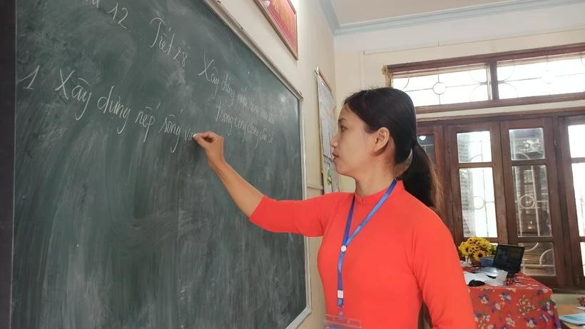 Thời gian thực dạy của giáo viên sẽ giảm từ 37 xuống 35 tuần. (Ảnh: PM/Vietnam+) giam-so-tuan-thuc-daydd.jpg