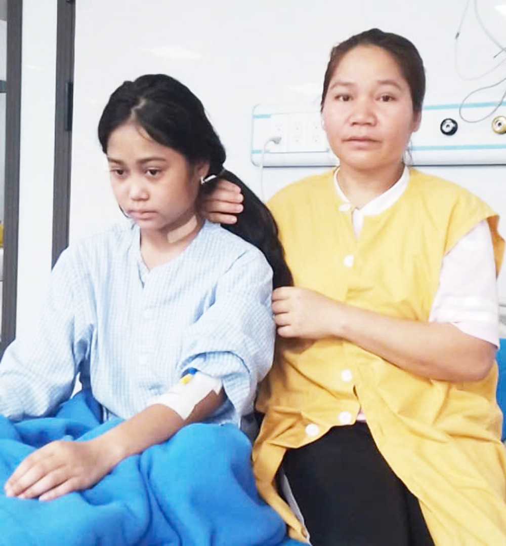 Em Rah Lan Thư được mẹ chăm sóc tại Bệnh viện Hùng Vương Gia Lai (ảnh nhân vật cung cấp). 1quang-tandd.jpg